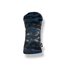 A golf club headcover featuring a dark blue and black cloud-like camouflage pattern, shown on a clean white background with a soft drop shadow.