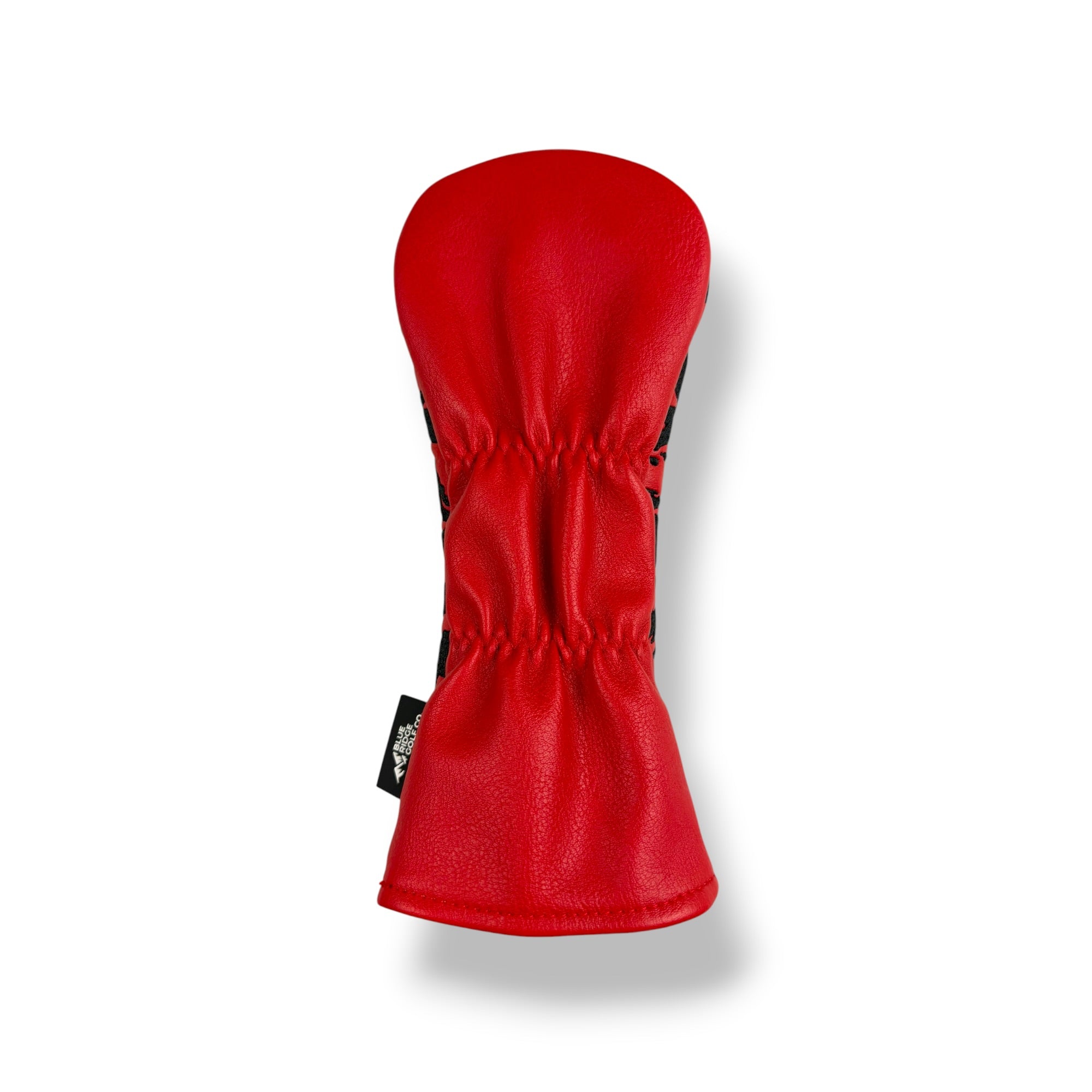 A bright red golf club headcover made of textured leather or faux leather, shown from the side against a clean white background with a soft drop shadow.