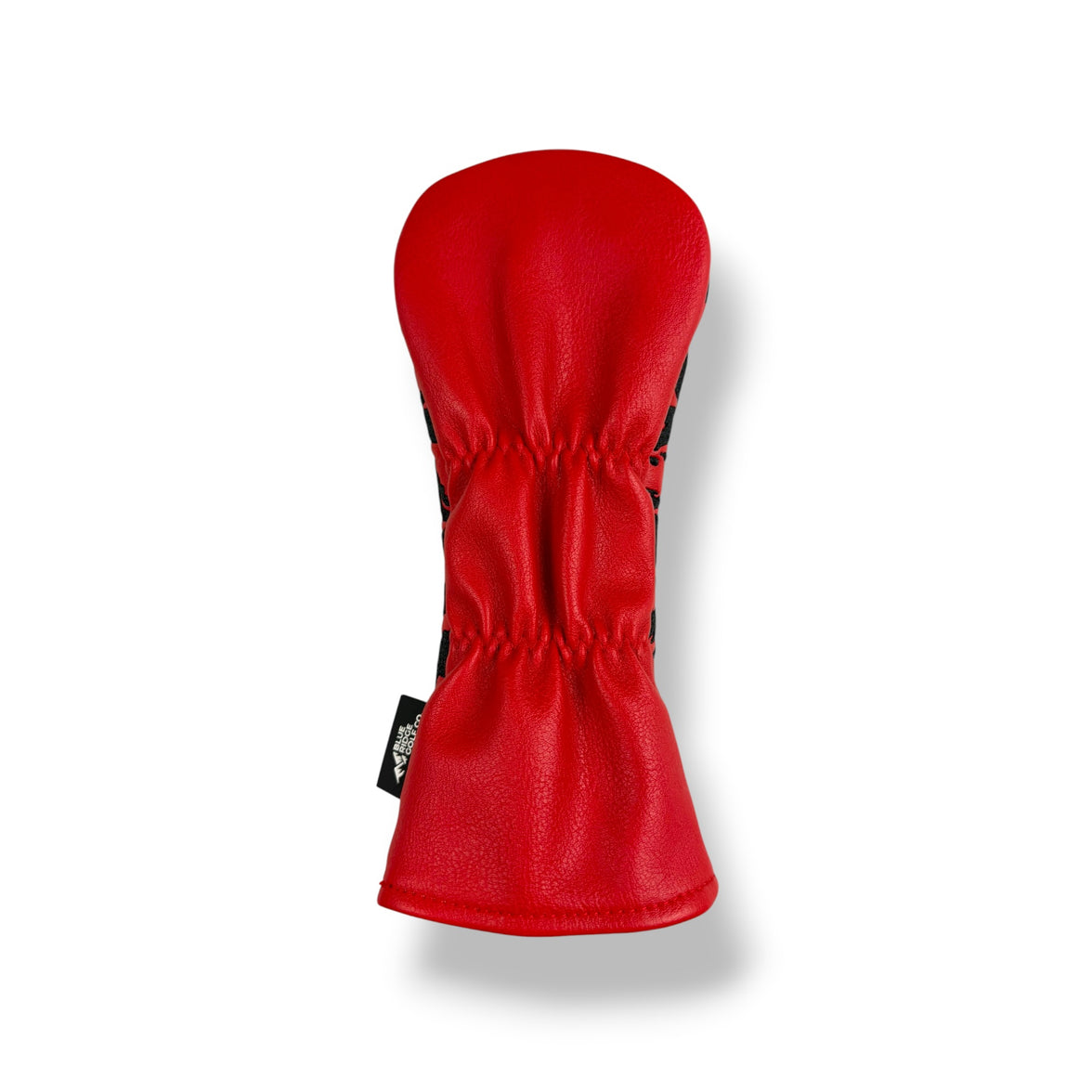 A bright red golf club headcover made of textured leather or faux leather, shown from the side against a clean white background with a soft drop shadow.