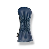 A navy blue leather golf club headcover with a black brand tag on the side, shown against a plain white background.