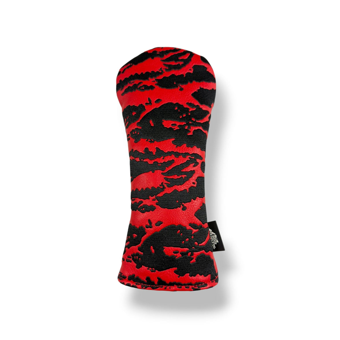 A golf club headcover with a bold red and black tiger stripe pattern, shown on a clean white background with a soft drop shadow.