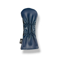 A navy blue leather golf club headcover with a black brand tag on the side, shown against a plain white background.